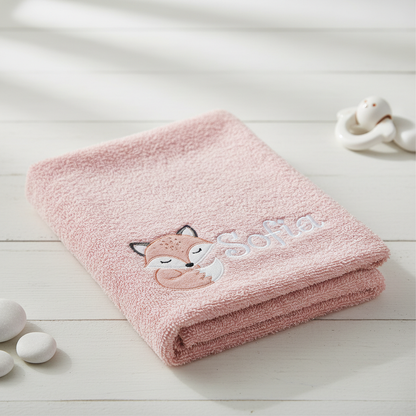 Asciugamano rosa con ricamo